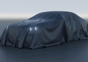BMW i5 teased under cover