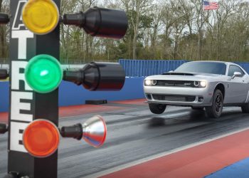 Dodge Challenger SRT Demon 170 doing wheel stand on drag strip