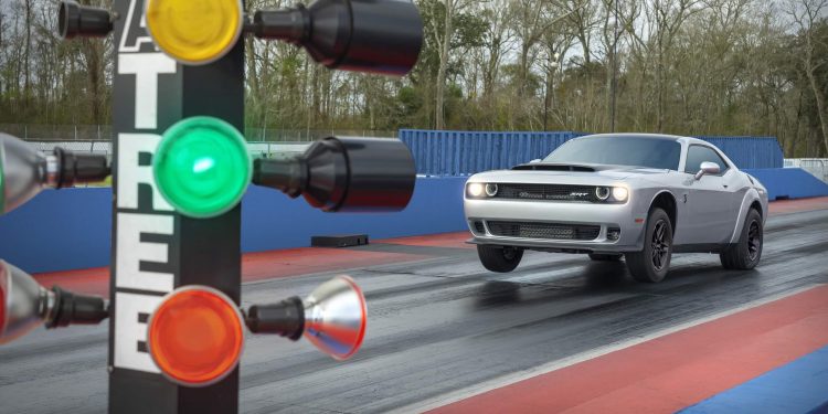 Dodge Challenger SRT Demon 170 doing wheel stand on drag strip