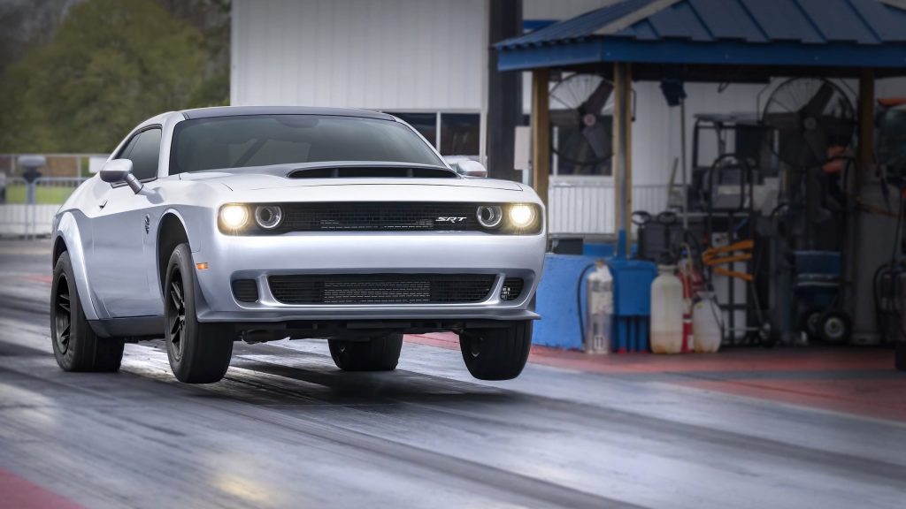 Dodge Challenger SRT Demon 170 doing wheel stand on drag strip