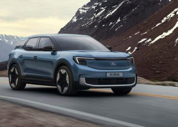 Electric Ford Explorer driving on mountain road