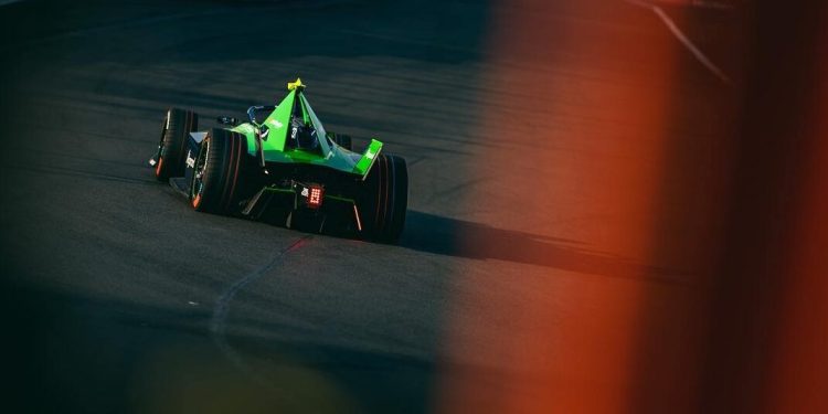 Nick Cassidy racing Formula E car on track