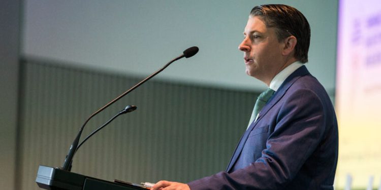 New Zealand Transport Minister Michael Wood giving speech