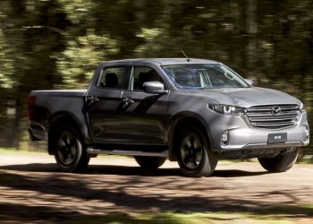 Mazda BT-50 GTX driving on dirt road