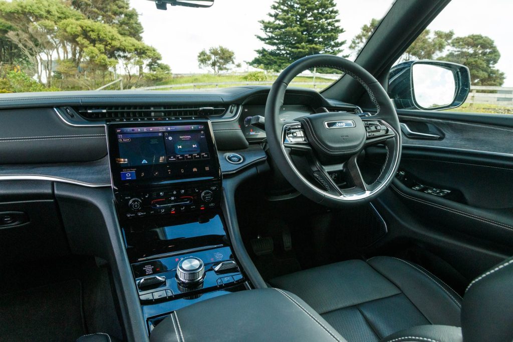 Interior shot of Grand Cherokee Overland, with steering wheel