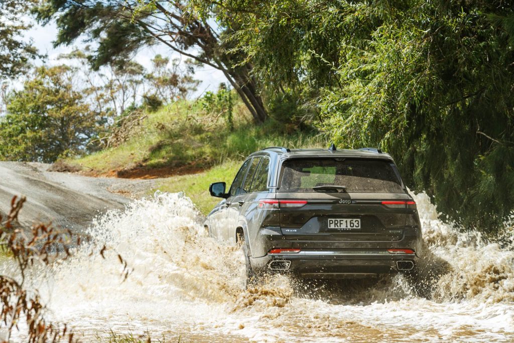 Jeep Grand Cherokee Overland fording a river