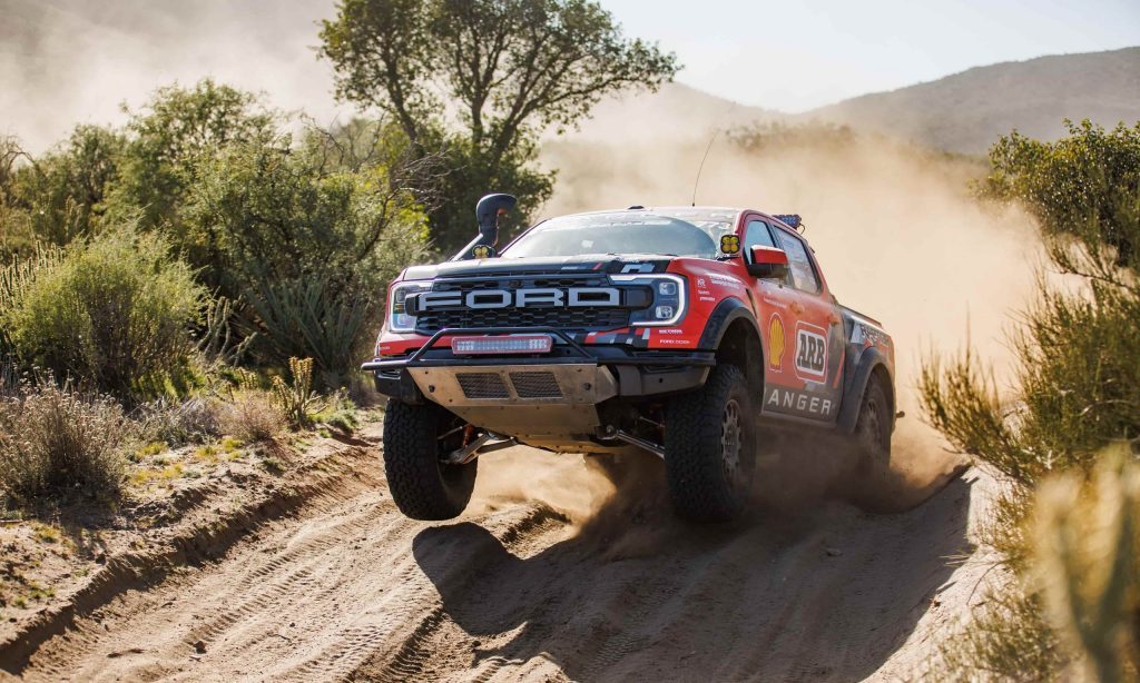 Ford Ranger Raptor Baja racer jumping on sand