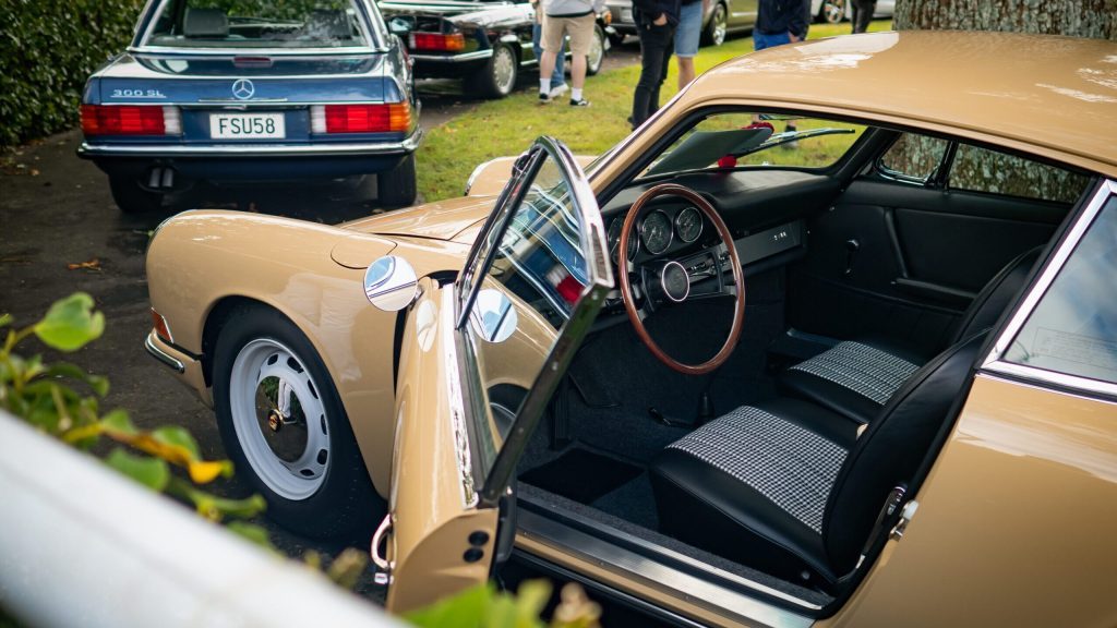 Porsche 911 with door open on display at Ellerslie Car Show