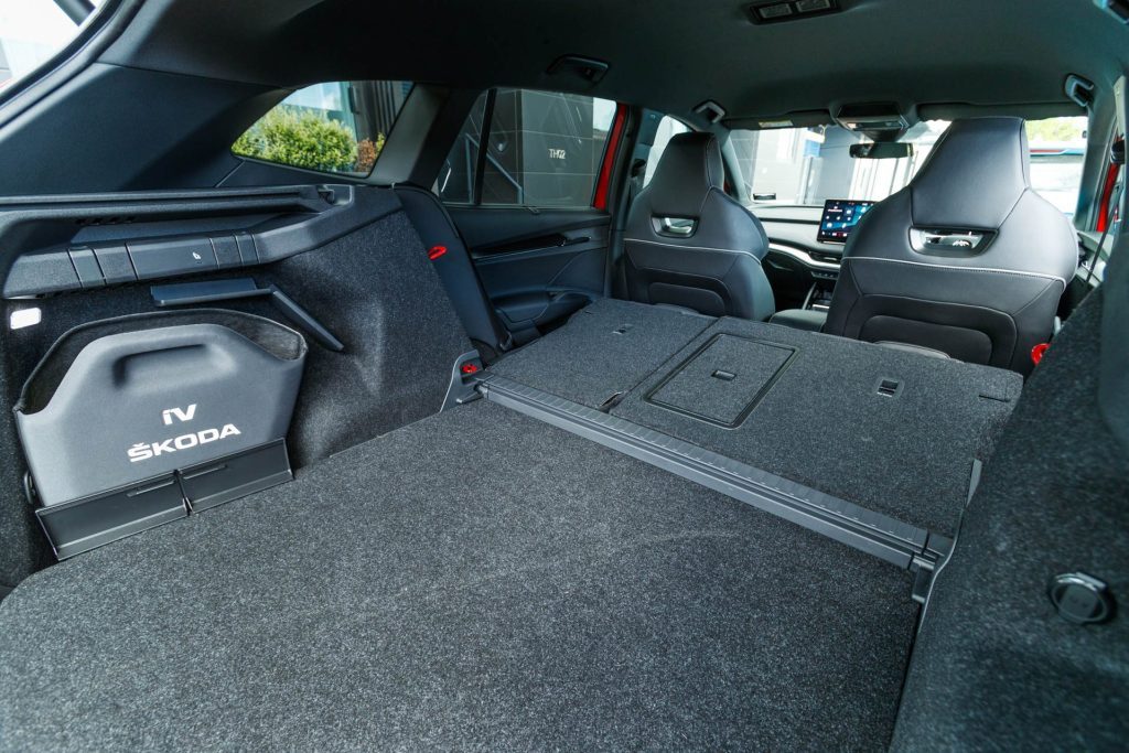 Skoda Enyaq Sportline 80 iV with the seats folded down and boot space shown