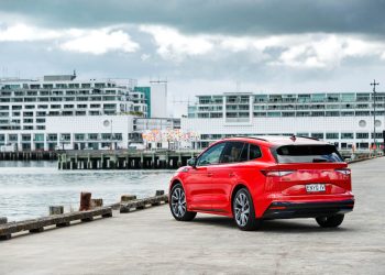 Rear quarter of the new Skoda Enyaq, pictured in red