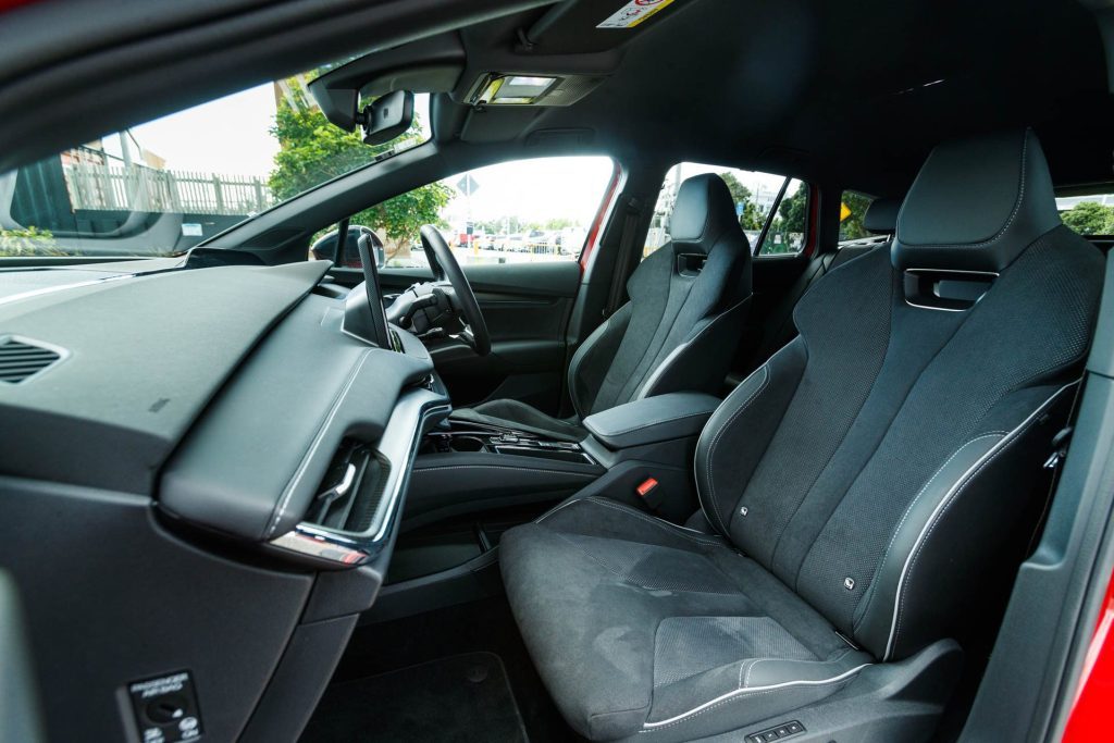 Sporty front seats of the 2022 Skoda Enyaq, and interior view