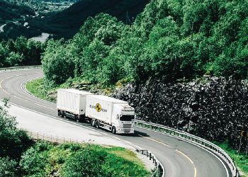 Scania truck driving on winding road