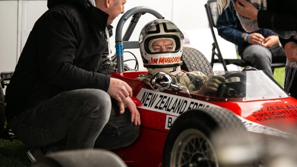 Jim Murdoch sitting in Formula 5000 race car at 2023 George Begg Festival