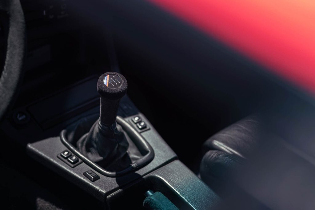 Suede dog-leg patterned shifter of the E30 M3 Evo