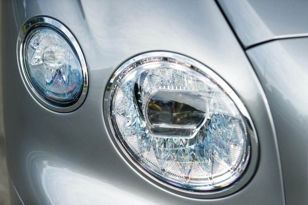 Crystal like front headlights of the Bentley Flying Spur Hybrid