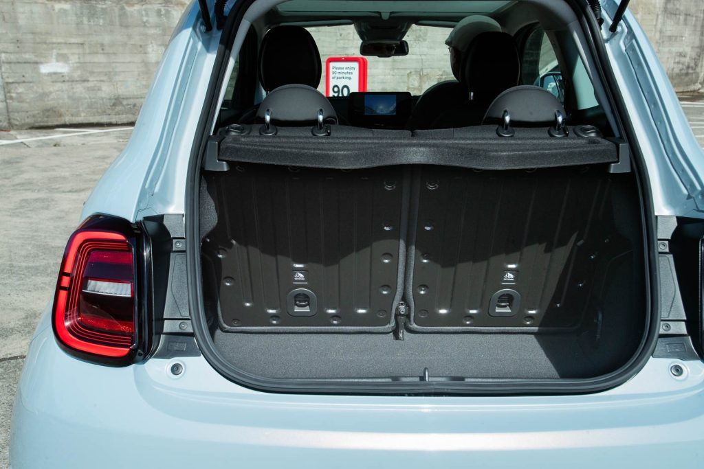 Boot space with metal backed seats