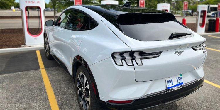 Ford Mustang Mach-E at Tesla fast-charger