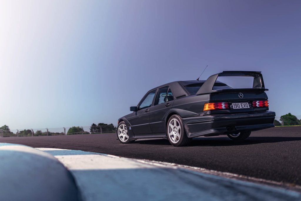 Rear end of the 190e Evolution II, parked on track