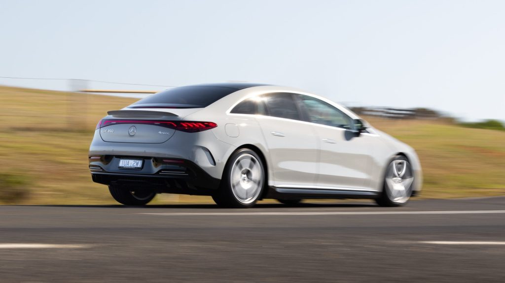 Mercedes-Benz EQE 350 4Matic+ driving on country road