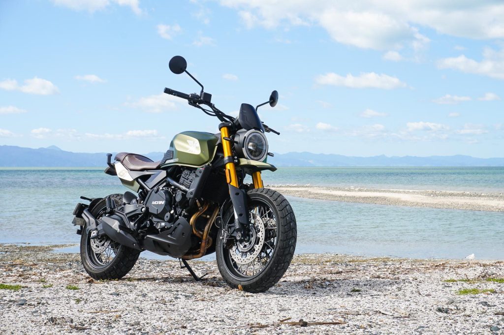 New Moto Morini Seiemezzo 650 SCR parked on an Auckland beach