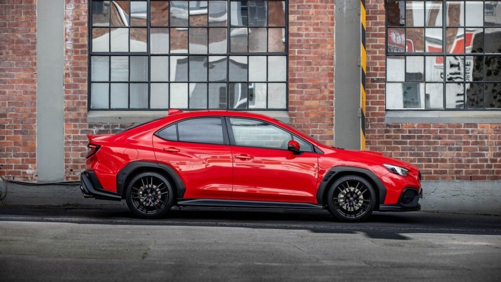 Subaru WRX 2.4T AKA side profile next to old building