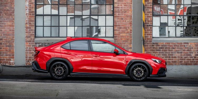 Subaru WRX 2.4T AKA side profile next to old building