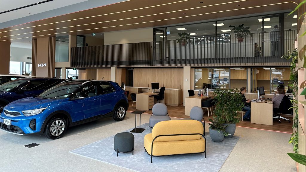 Cars inside of new Kia North Shore dealership