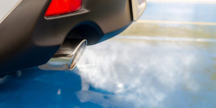 Smoke emitting from car exhaust