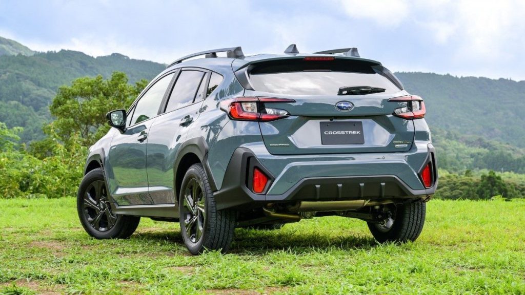 Subaru Crosstrek rear view by mountains