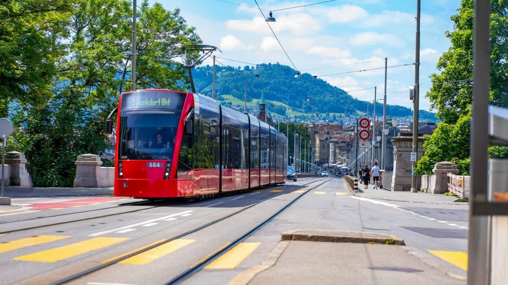 Red electric tram in Europe