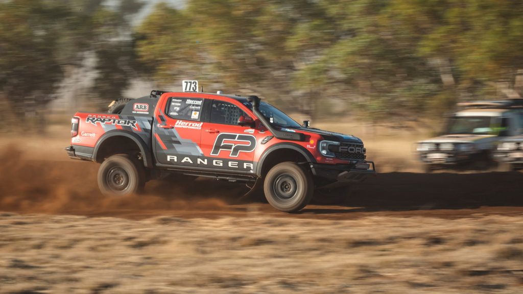 Ford Ranger Raptor race truck racing on dirt track