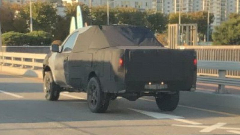 Kia ute rear three quarter view