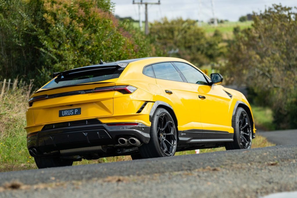 Lamborghini Urus Performante driving around corner on country road