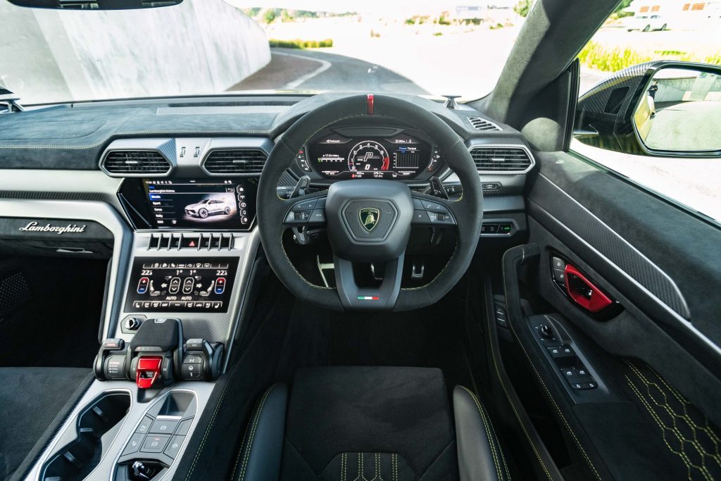 Front cockpit view of Lamborghini Urus Performante interior and steering wheel