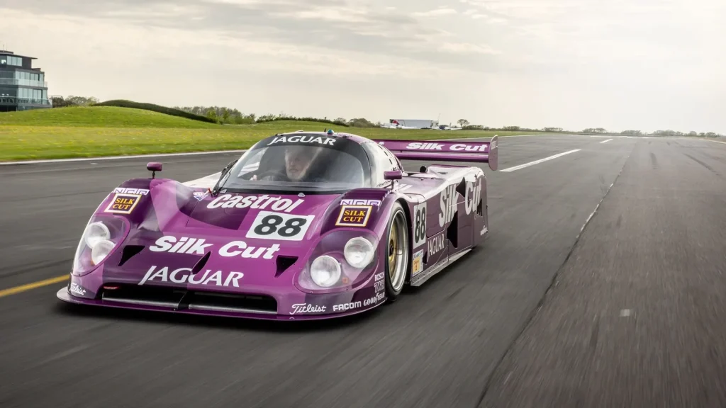 Jaguar XJR-12 LM driving down runway