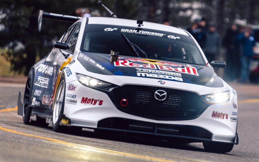 Mad Mike's Mazda3 Pikes Peak time attack car racing on road 