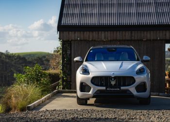 Maserati Grecale parked in front of house in countryside