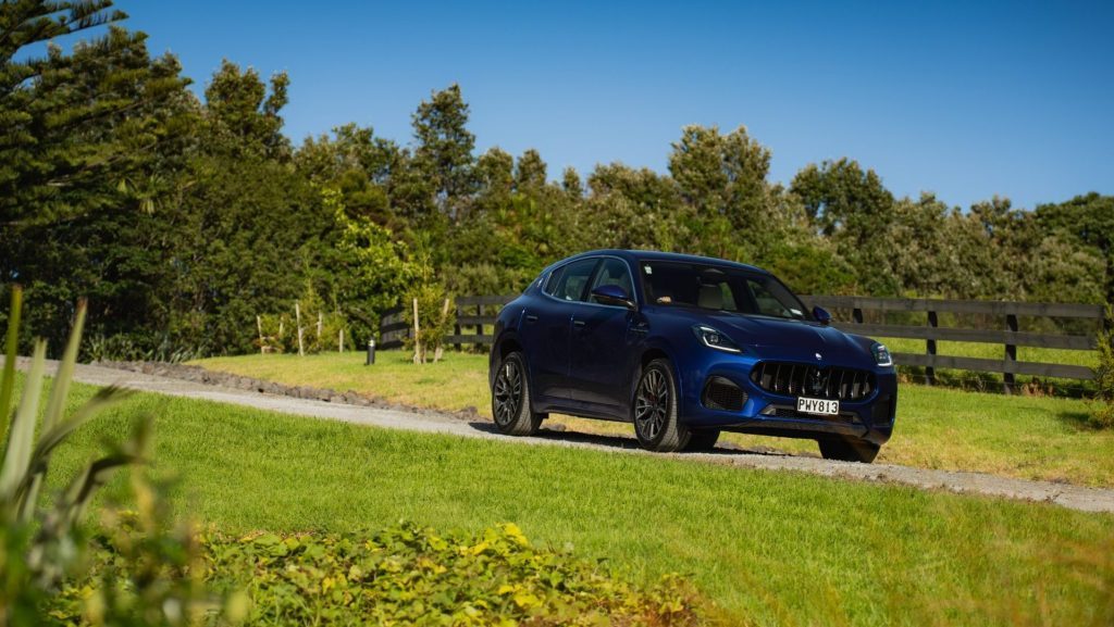 Maserati Grecale GT driving down gravel road