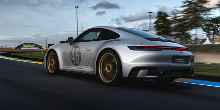 Porsche 911 GTS Le Mans edition driving on track