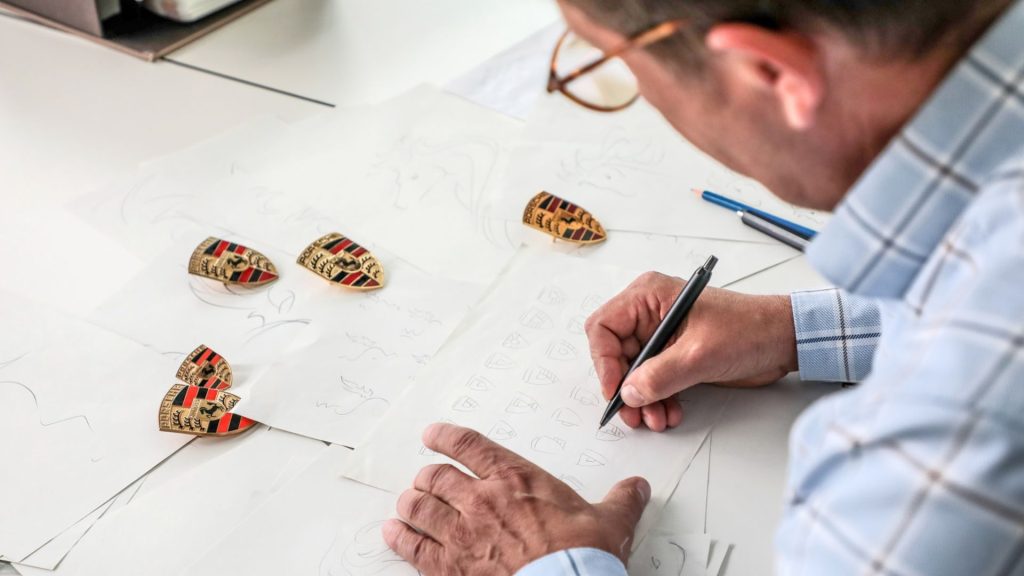 Man drawing new Porsche logo