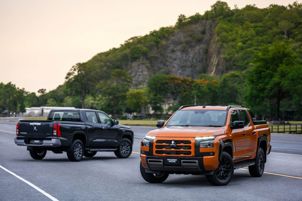 Two 2024 Mitsubishi Tritons parked next to each other