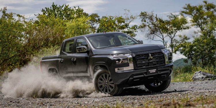 2024 Mitsubishi Triton driving on gravel road