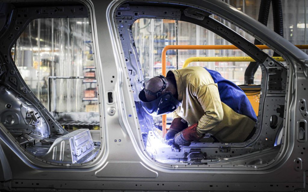 Man welding part on new Renault 5