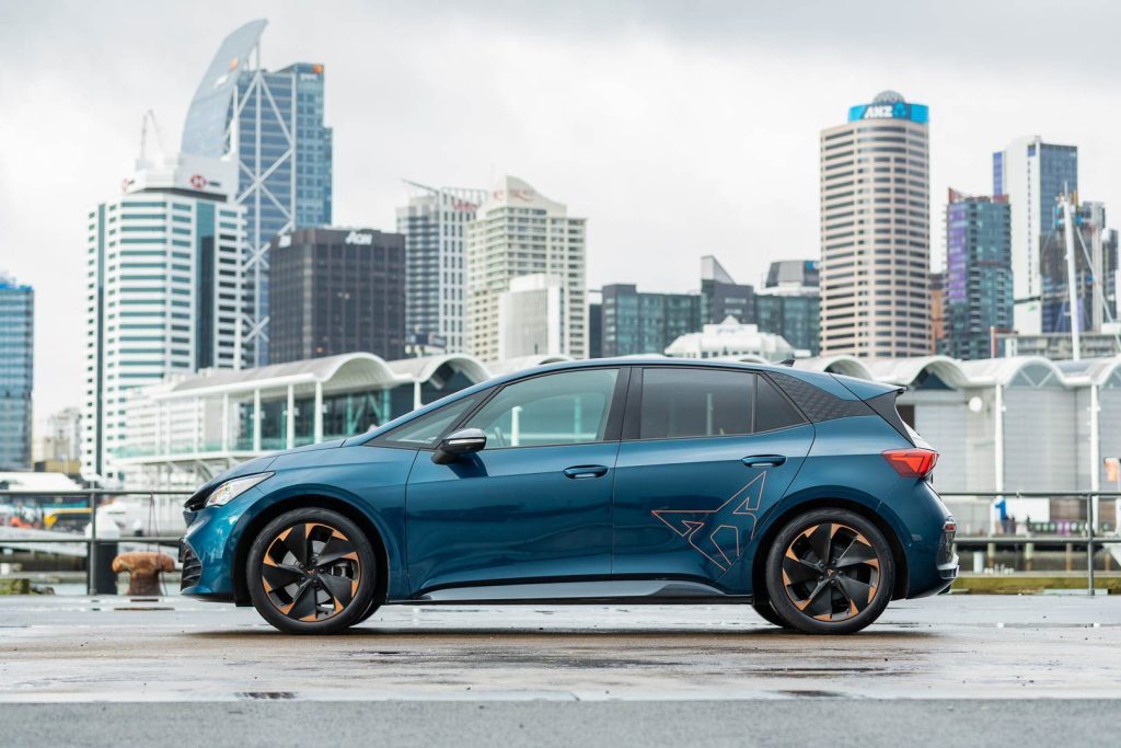 Cupra Born V side profile, in blue