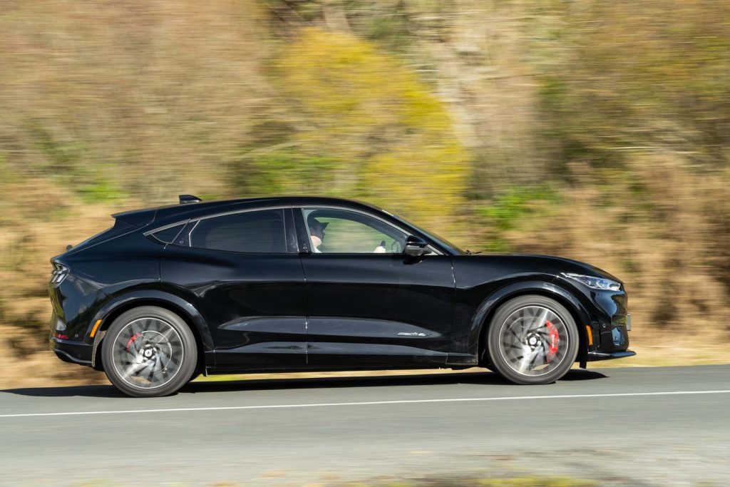 Panning shot of Mustang Mach-E GT from the side
