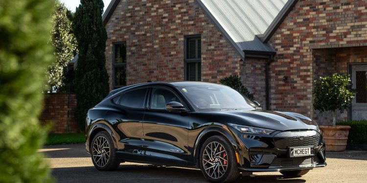 2022 Ford Mustang Mach-E GT parked in a courtyard