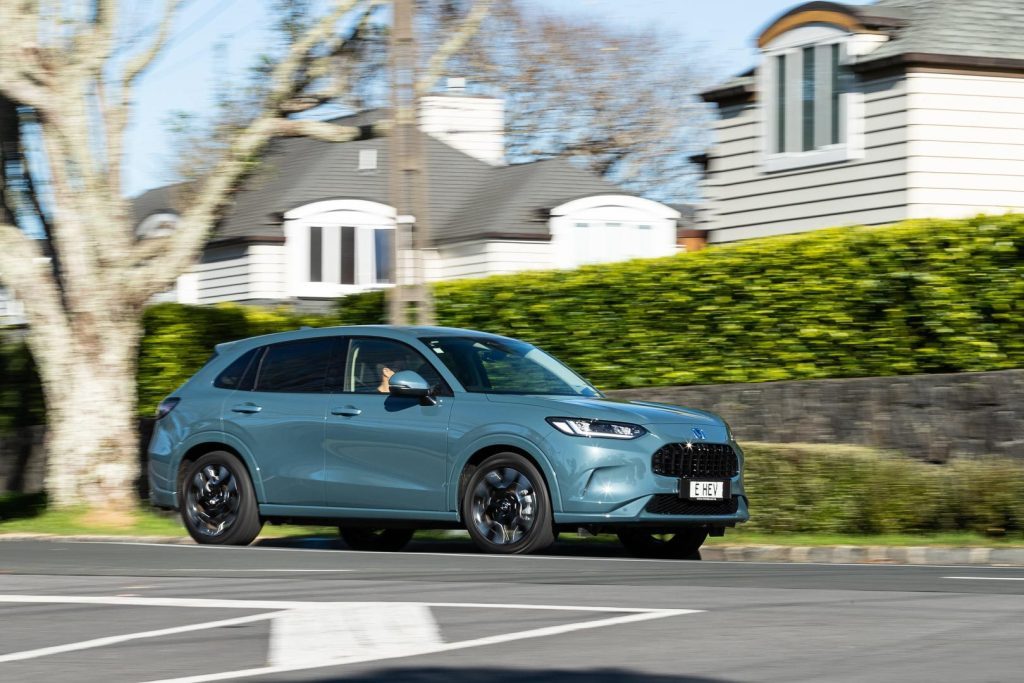 2023 Honda ZR-V driving past in a residential area