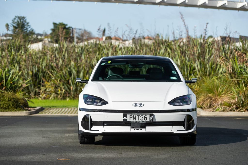 Front end of the Hyundai Ioniq 6, parked in the sun