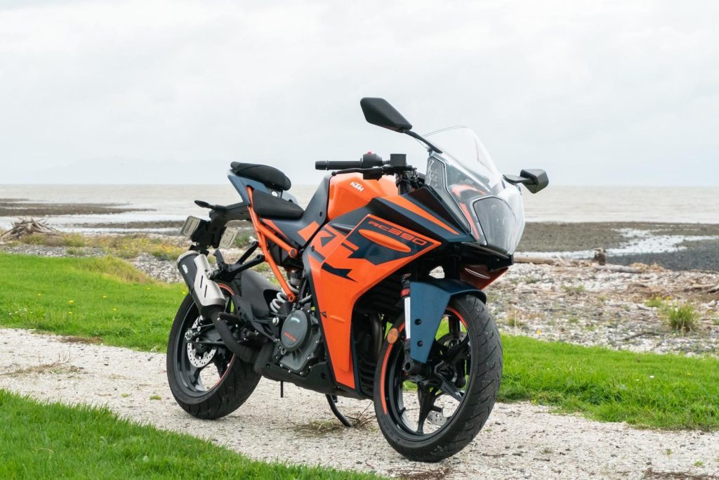 KTM RC390 front quarter shot, parked on a white path