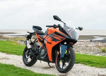 KTM RC390 front quarter shot, parked on a white path